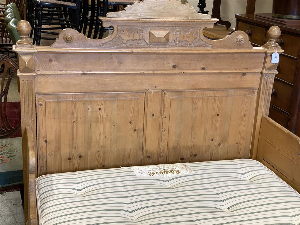 A 19th century Continental pine bed frame and mattress, width 130cm, length 190cm